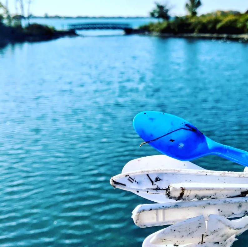 Plastic silverware waste collected by water