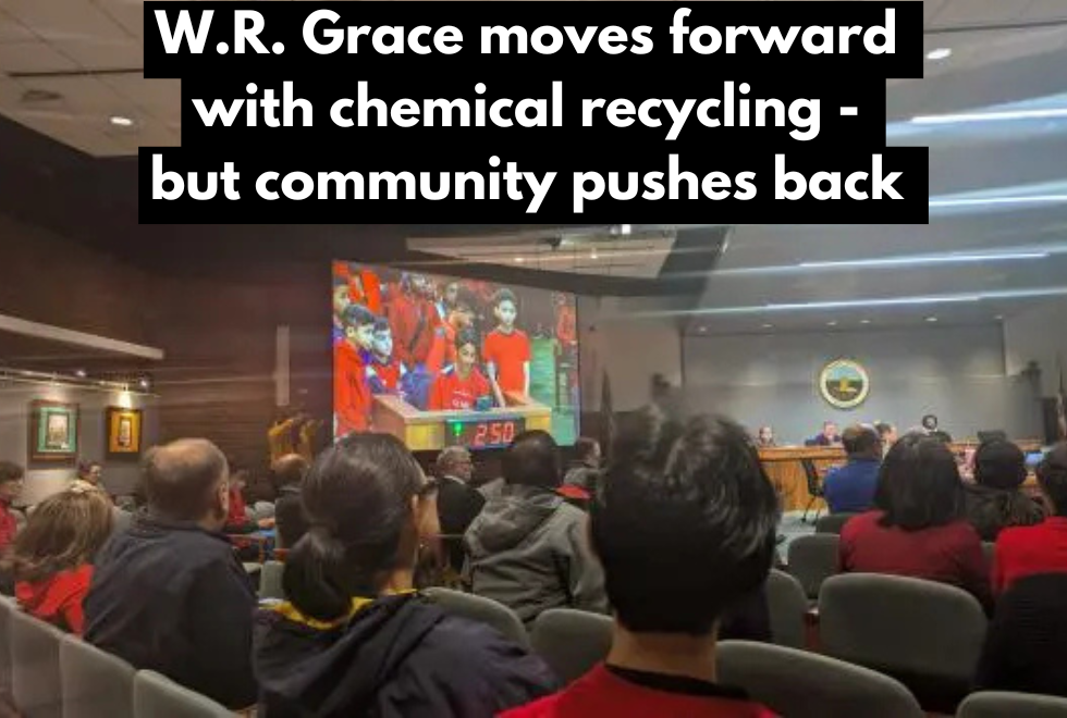 Text says "W.R. Grace moves forward with chemical recycling - but community pushes back" over a picture of a public hearing room full of people wearing red shirts 