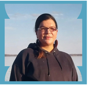 Leanna standing in front of one of the Great Lakes