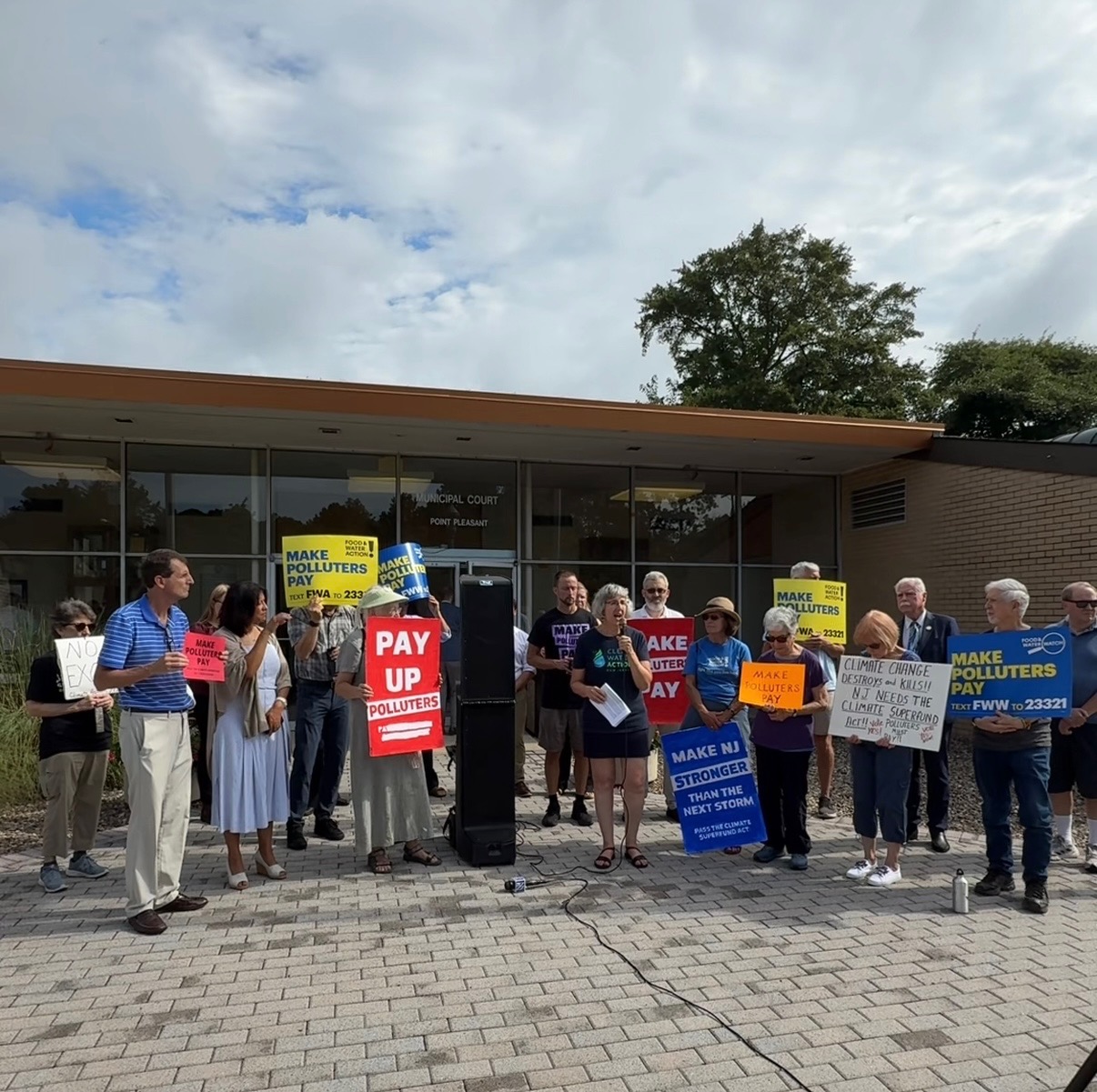 Amy Goldsmith speaking at a rally to urge passage of NJ Climate Superfund