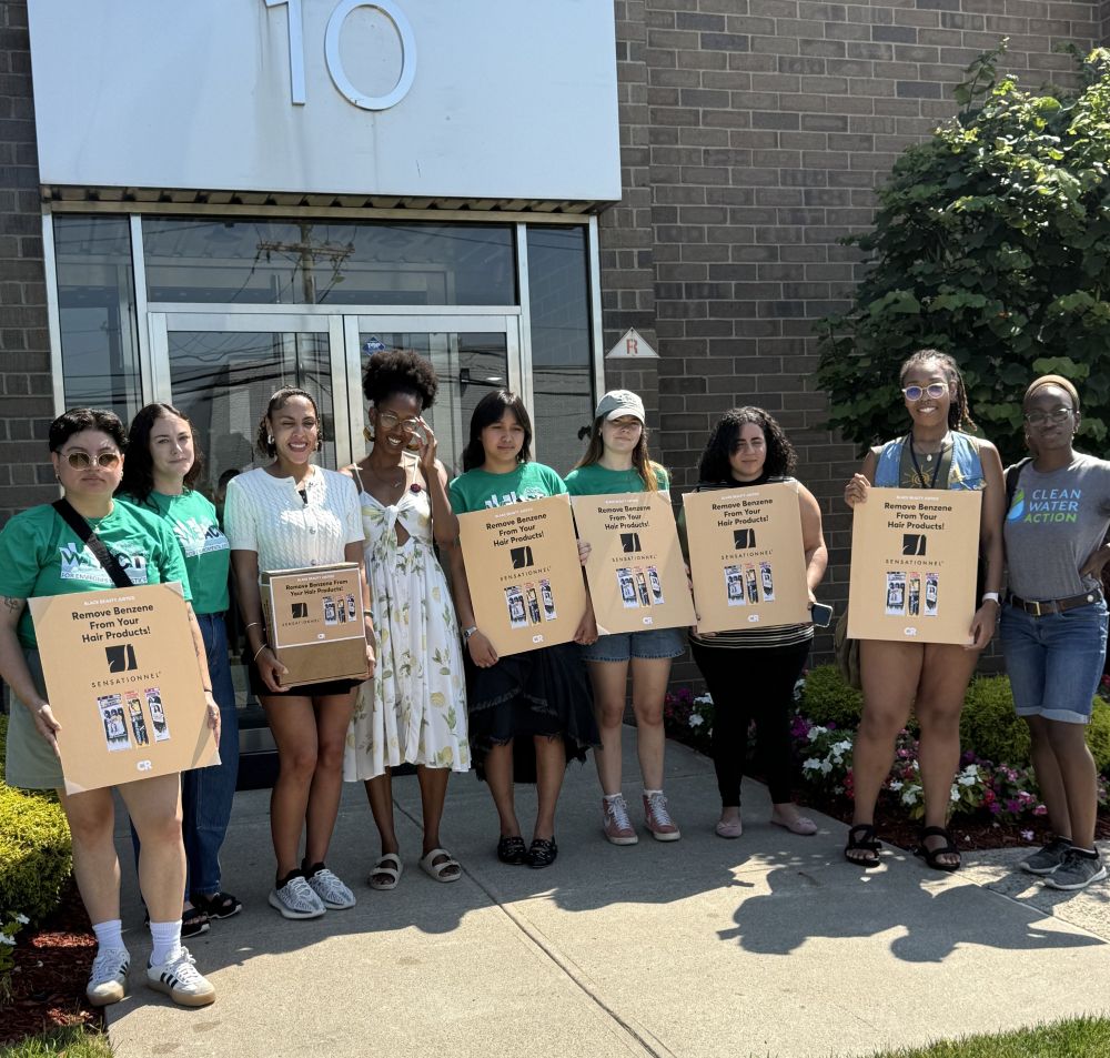 X Braithwaite and Tolani Taylor of Clean Water Action delivering petitions