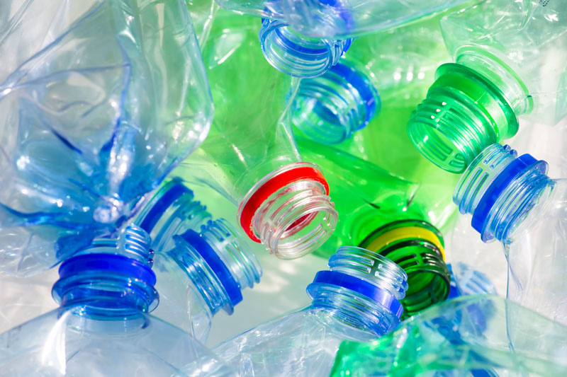 Pile of cololrful plastic bottles. Photo Credit: Don Pablo/Shutterstock