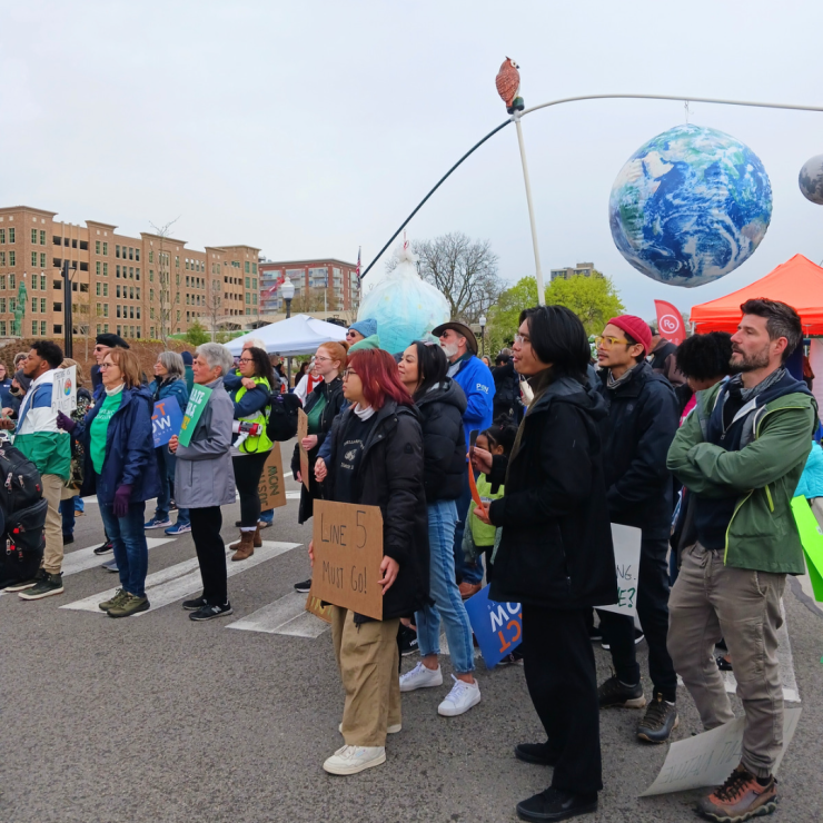 Crowd listening to speaker at Oakland County Earth Day event.