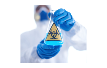 Image of a scientist holding a test tube with blue liquid and with toxic sign on the front of it.