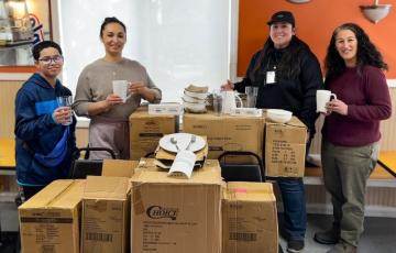 Image of people holding reusable serviceware items