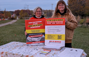 Table with Money Out Of Politics petitions 