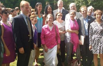 Advocates Pose With Governor At Signing of New Energy Bill