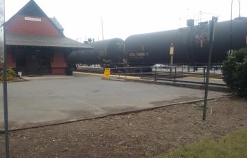 Tank cars travel on train tracks through Brunswick, MD
