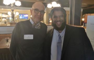 : CWA MA Political Director Jeff Knudsen (left) with MassAlliance Exec. Dir. Jordan Berg Powers at a Fundraiser this Spring. 