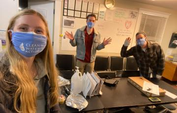 Picture of canvassers waving with Clean Water Action masks