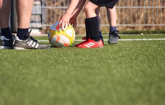 Soccer being played on artificial turf