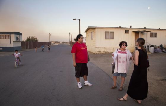 Rosanna Esparza (center) with residents in Kern County