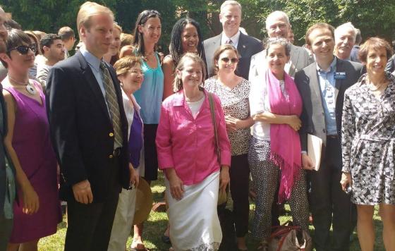 Advocates Pose With Governor At Signing of New Energy Bill