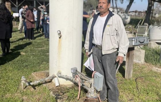 Community Water Tour in the San Joaquin Valley - Mr. Benitez next to his groundwater well