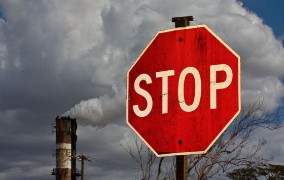 Smokestack and stop sign