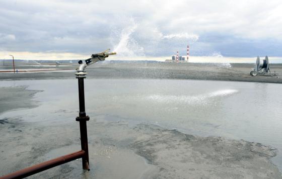 Sprinkler at a coal ash disposal site. Photo credit: bibiphoto / Shutterstock